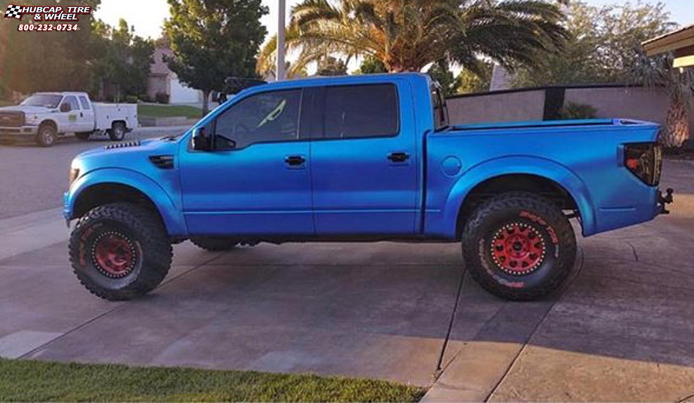 vehicle gallery/ford f 150 raptor xd series xd222 enduro beadlock x  Red and Black wheels and rims