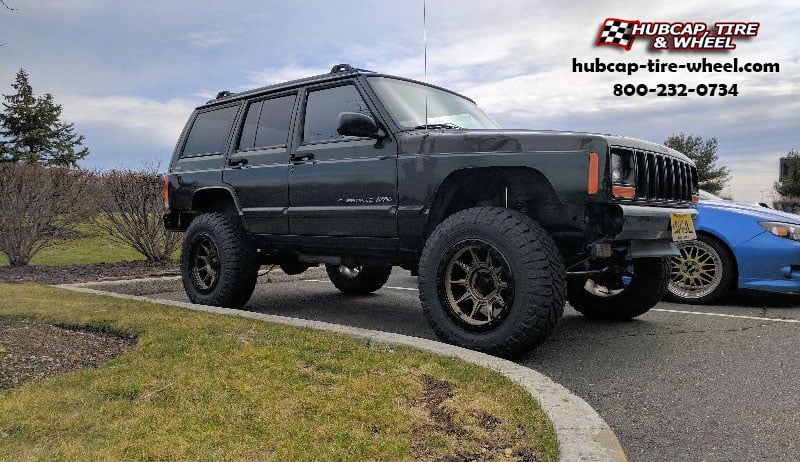 vehicle gallery/1998 jeep cherokee atx series ax202  Bronze w/ Black Lip wheels and rims