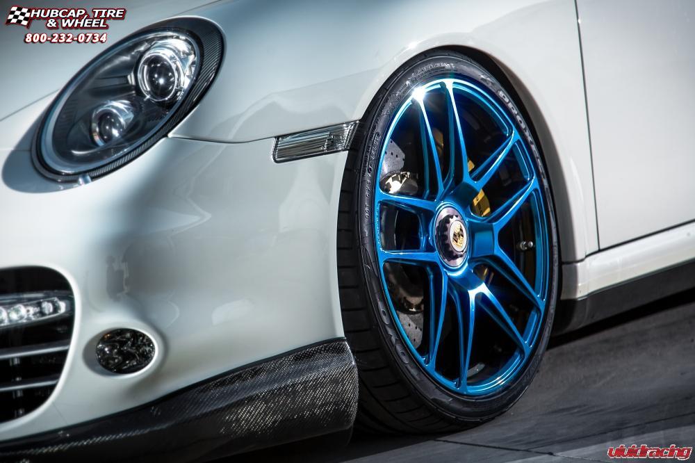 vehicle gallery/porsche turbo s niche targa 19x85  Hi Luster Polished | Pica Blue Tint wheels and rims