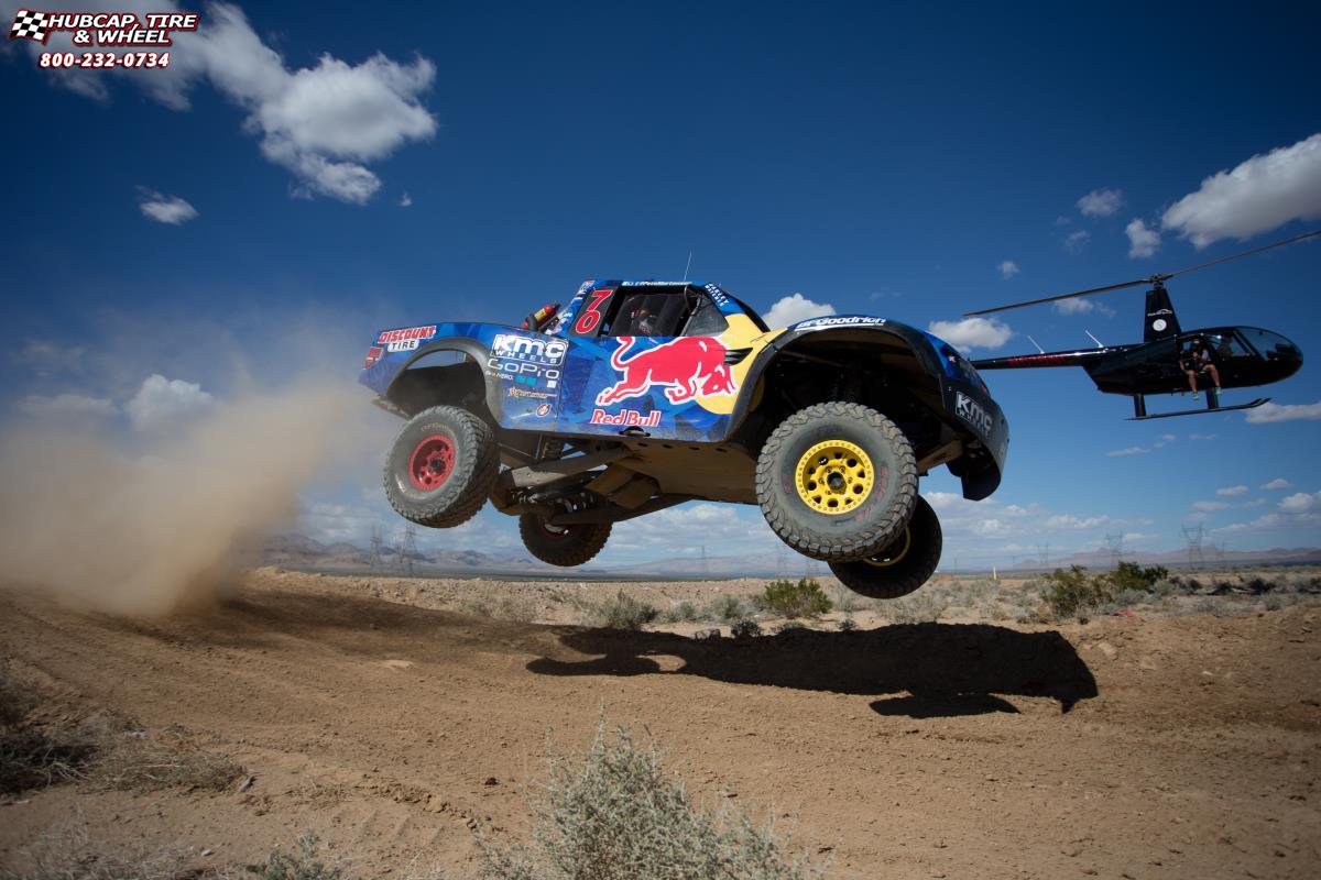 vehicle gallery/ford f 150 raptor xd series xd222 enduro beadlock x  Red and Yellow wheels and rims