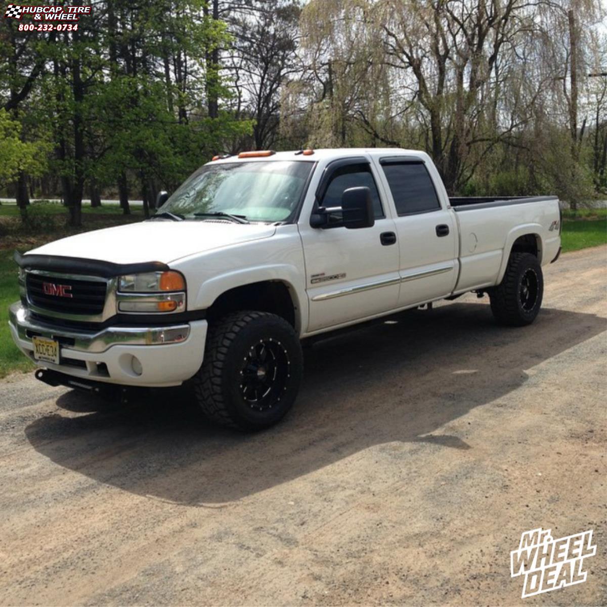 vehicle gallery/gmc sierra 2500 moto metal mo962 18x10  Gloss Black & Milled wheels and rims
