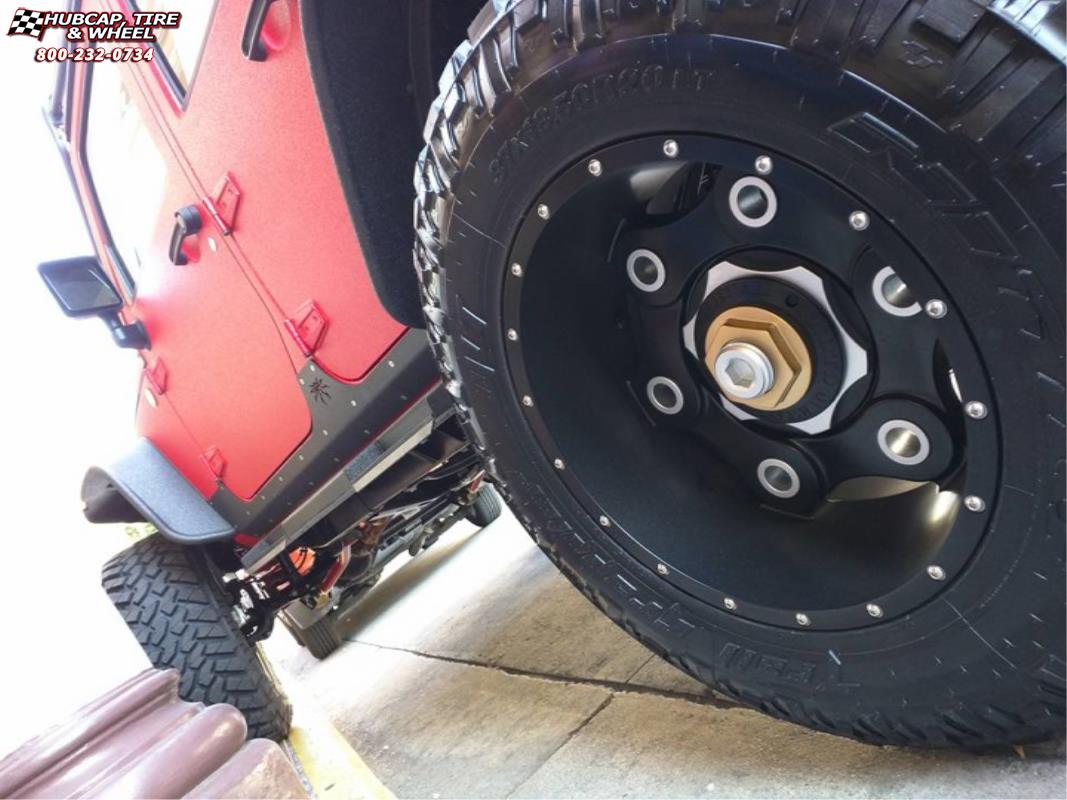 vehicle gallery/jeep wrangler moto metal mo977 link  Satin Black Gold Center wheels and rims