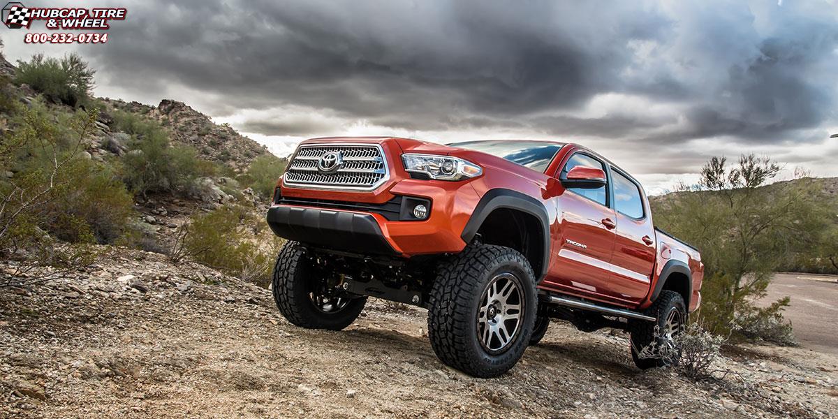 vehicle gallery/toyota tacoma fuel recoil d585 0X0  Brushed Face | Gloss Black Windows | Gloss Black Ring wheels and rims