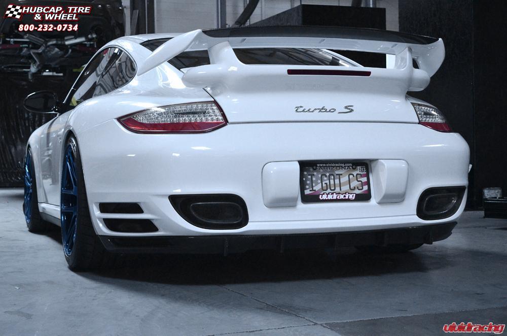 vehicle gallery/porsche turbo s niche targa 19x85  Hi Luster Polished | Pica Blue Tint wheels and rims