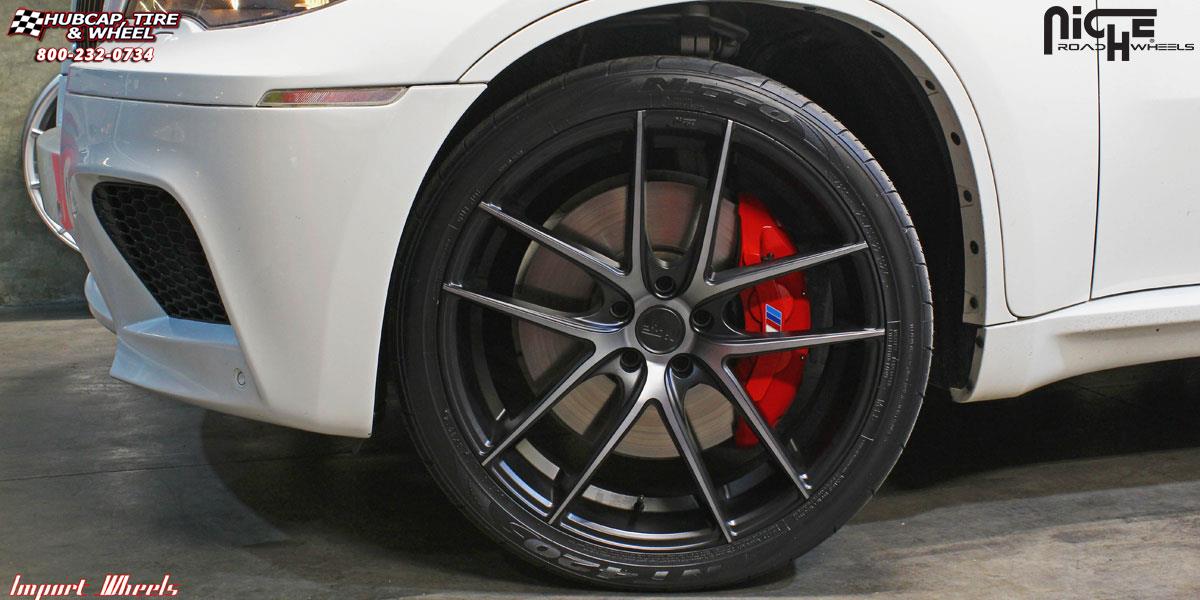 vehicle gallery/bmw x6m niche targa m130 22x9  Black & Machined with Dark Tint wheels and rims