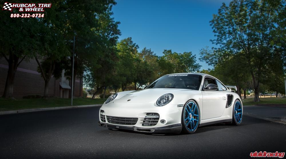 vehicle gallery/porsche turbo s niche targa 19x85  Hi Luster Polished | Pica Blue Tint wheels and rims